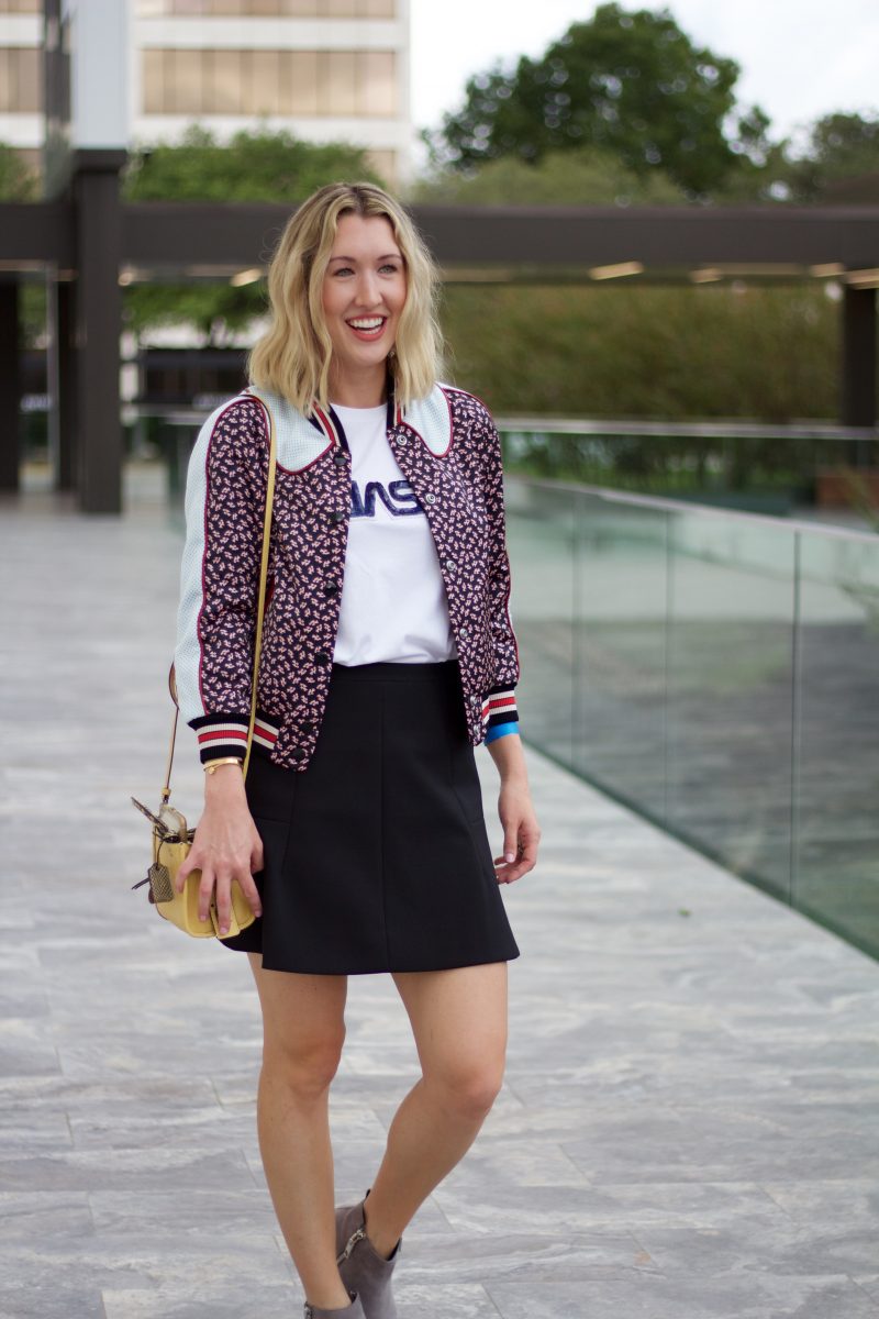 coach bomber jacket outfit. styling a bomber jacket with a skirt.